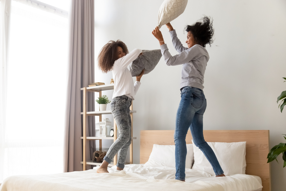 Happy family in their air conditioned home.
